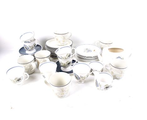 A Susie Cooper 'Glen Mist' tea service and six Royal Doulton 'Hampstead' trios. The tea service comprising eight plates, seve