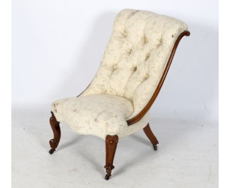 A Victorian button back nursing chair. H84cm
