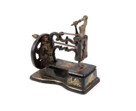 An antique Weir miniature antique Sewing Machine, 1860s, stamped to the needle plate 2 Carlisle Street, Soho, London. Constru