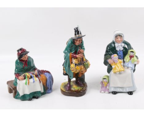 Three Royal Doulton china figures. Including The Mask Seller HN 2103; The Rag Doll Seller HN 2944 and Silks and Ribbons HN 20