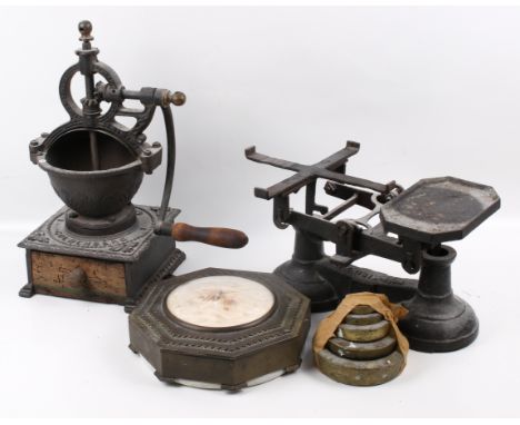 Two Victorian kitchenalia item and another. Including a Garanite Goldenberg coffee grinder, a set of balance scales and a Dra