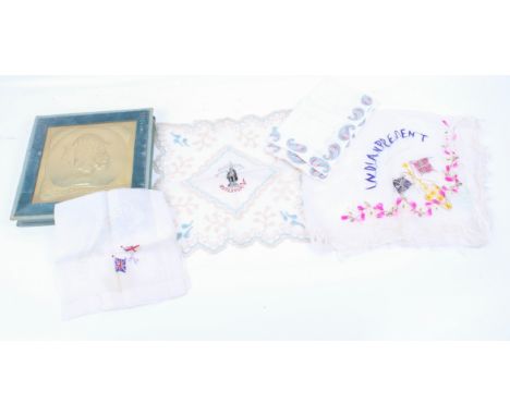 Small group of hand embroidered silks, lace and a Paisley edged handkerchief in a period Cadbury Cocoa box. 