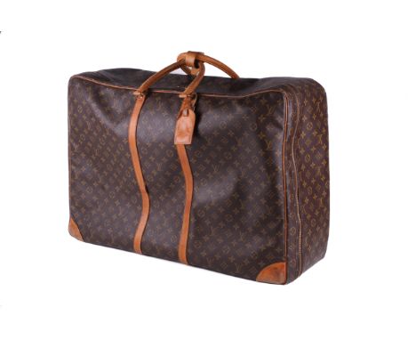 A vintage Louis Vuitton Sirius travel bag. 1997, labelled 'SP0927'. Monogram Canvas with natural leather trims, handles, gold