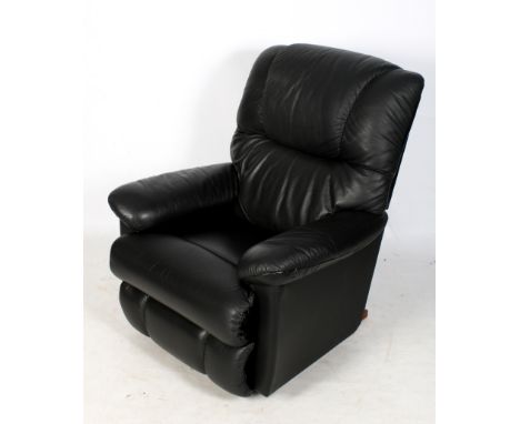 A La-Z-Boy rocker recliner lounge armchair. Black leather upholstered. Yr. 2006. H103cm x W88cm x D79cm. ** Being sold as a c