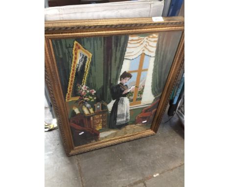 Tapestry of woman reading a book 