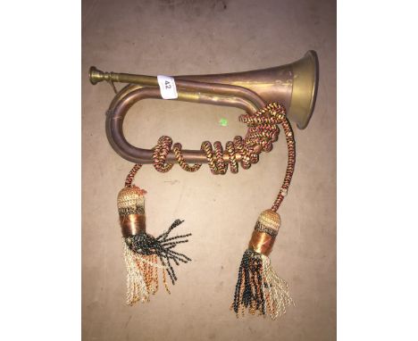 A brass and copper bugle 