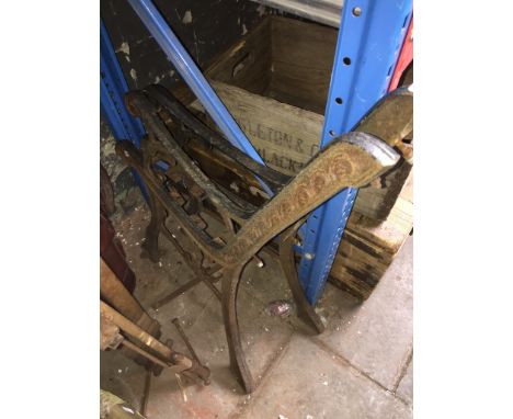 A pair of cast iron bench ends 