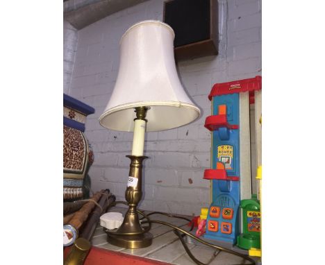 A brass table lamp 