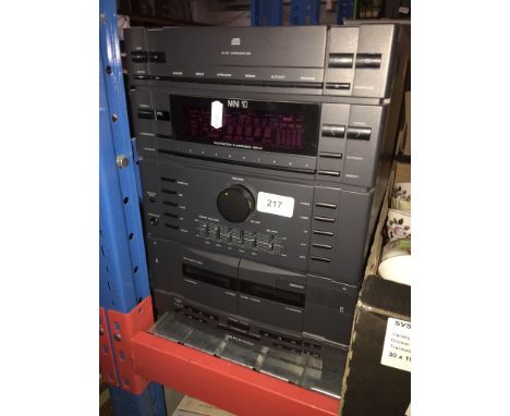 A Grundig hi fi system with 1 speaker. 