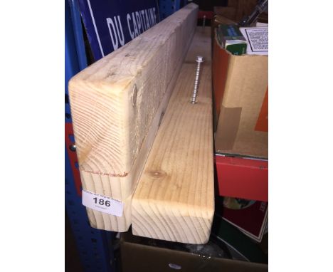 A hand made box with handle and a wooden shelf 