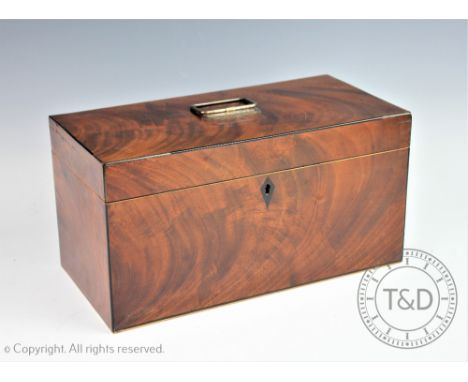 A Victorian mahogany tea caddy, the rectangular shaped caddy with stained kite escutcheon and hinged cover opening to reveal 