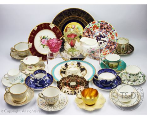 An assortment of 19th century and later decorative porcelain to include a Coalport blue Batwing trio, a Flight Barr and Barr 