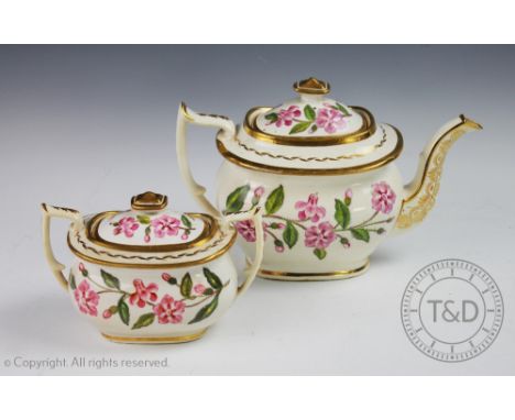 An English porcelain tea pot and sucrier and cover, probably Spode circa 1825, enamelled with pink flowering garden flowers, 