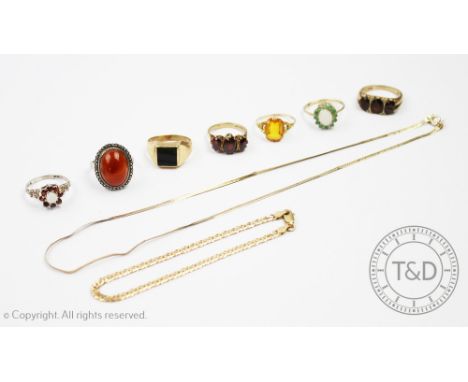 A collection of rings, to include; two garnet set 9ct yellow gold rings, an onyx set signet ring stamped '375', an orange sto