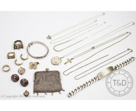 A collection of silver and silver coloured jewellery, to include; an identity bracelet, assorted modernist rings, pendants, a