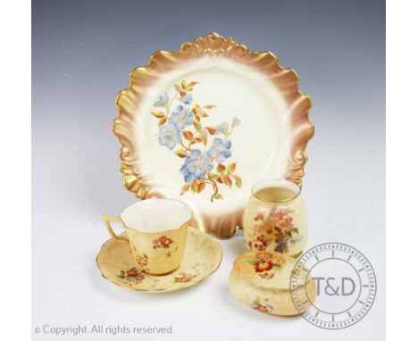 A selection of Royal Worcester porcelain Blush Ivory  to include a moulded plate, date code for 1889, enamelled with blue flo