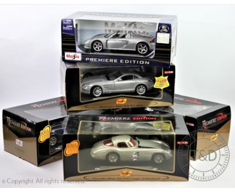 Five Maisto Premier Edition 1:18 scale Sport car models comprising; Porsche Carrera GT, Aston Martin DB7 Vantage, Morgan Aero