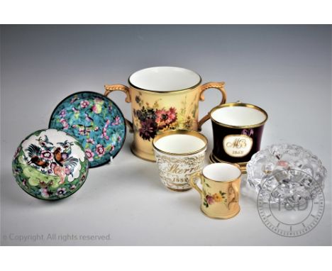 A Royal Worcester blush ivory loving cup painted with floral sprays to the exterior with two scroll handles with a smaller si