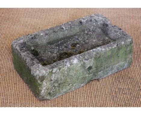 A 19th century rectangular stone trough, 19cm H x 58cm W x 34cm D