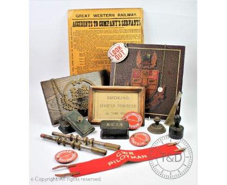 A collection of Great Western Railway and other railwayana items, to include a GWR cast iron paper weight, a BR iron weight, 