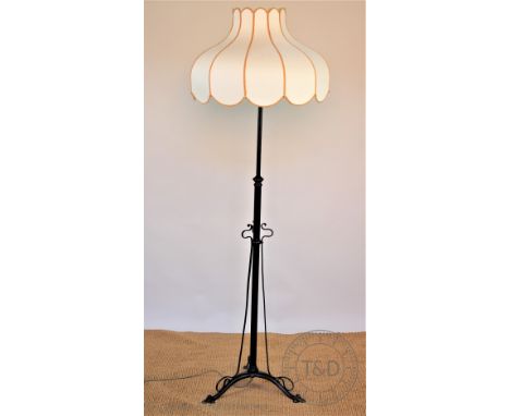 An Art Nouveau brass standard lamp, now painted black, 150cm CONDITION REPORT: Lighting lots are sold as decorative items onl