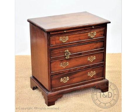 A George III style mahogany chest, of four long drawers, on bracket feet, 64cm H x 59cm W x 39cm D, with a mahogany cupboard,