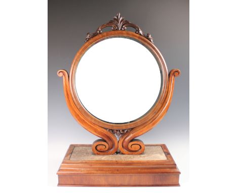 A Victorian carved walnut dressing table mirror, with circular mirror on a deep plinth inset with fossil marble, 78cm H x 55c