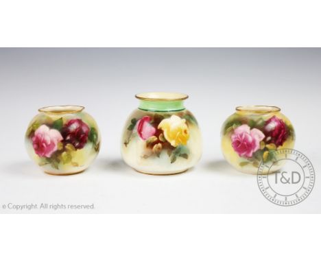 A associated pair of Royal Worcester porcelain Blush Ivory vases, shape G.161, date code for 1915 and 1923, each decorated wi