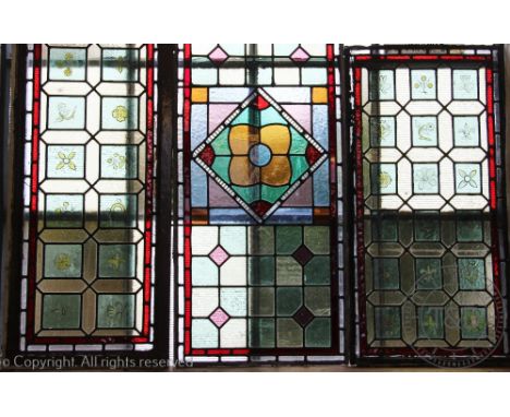 Five Victorian stained glass panels, including one decorated with a bird to the centre, largest 99cm x 42cm CONDITION REPORT: