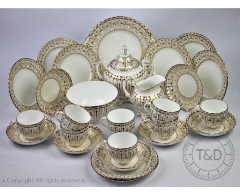 A Victorian Staffordshire gilt decorated tea service, comprising; eight teacups and seven saucers, eight cake plates, a milk 