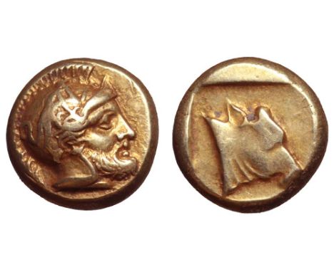 Lesbos, Mytilene EL Hekte. Circa 412-378 BC. Head of Ares right, wearing crested helmet decorated with forepart of griffin / 