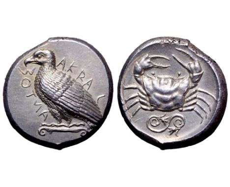 Sicily, Akragas AR Tetradrachm. Circa 460-446 BC. Sea eagle standing left on Ionic capital, AKRACANTOΣ around / Crab; spirall