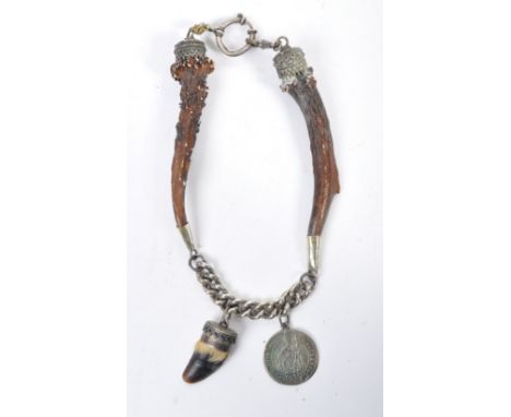 Unknown Production - an original vintage prop / costume horn necklace. The necklace appearing to have been fashioned into a b