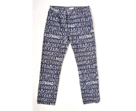 A rare pair of Maschino Jeans made ' Alphabet ' designer jeans / trousers, Made In Italy. Navy, with light blue ' ABC ' text 