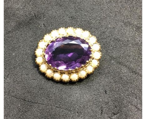 Amethyst & Cultured Pearl cluster brooch set with 20 collet set half cultured Pearls with central Amethyst which measure appr