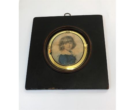 Antique 18th /19th century portrait miniature of a young boy, there are marks to the gold gilt on the frame, some staining to