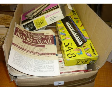Box containing a large quantity of Hutchinson's Pictorial History of the War, together with an original boxed Stylophone pock