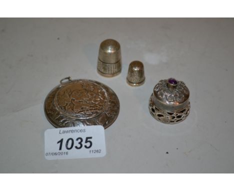 Continental silver powder compact decorated with oriental style flowers and insects, a small Continental silver box, the hing