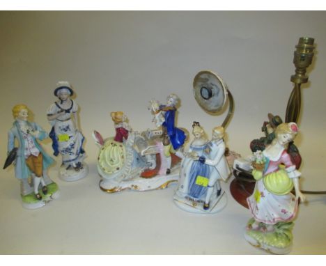 Quantity of various Continental porcelain figures together with a porcelain table lamp and a painted metal table lamp