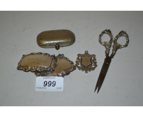 Pair of silver decanter labels, pair of silver mounted scissors, silver fob and a plated purse