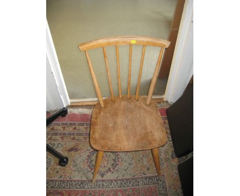 Set of four Ercol stick back kitchen chairs in light elm and beech