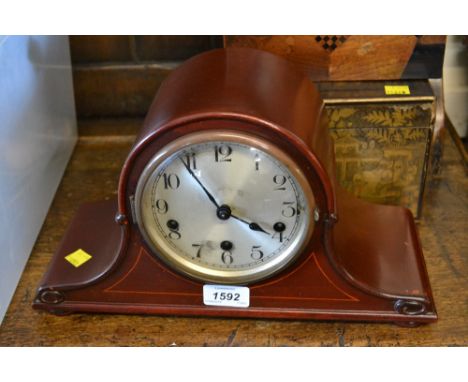 Early 20th Century mahogany dome shaped mantel clock together with a French black slate mantel clock