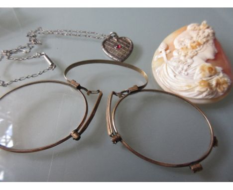 19th Century oval carved shell cameo portrait, together with a pair of plated pince-nez and a pendant necklace
