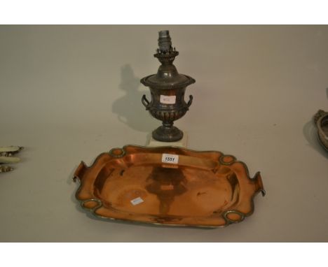 Copper two handled tray and a table oil lamp in the form of an urn on marble base