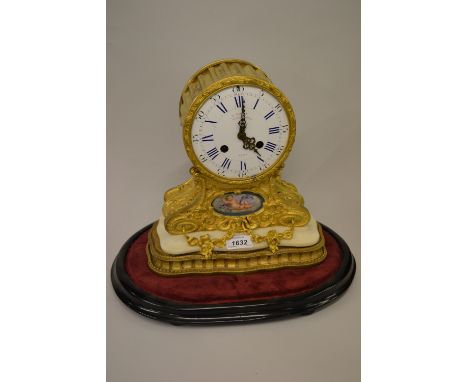 19th Century French ormolu drum form mantel clock, the enamel dial with Arabic and Roman numerals signed T. Martin, Regent St