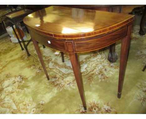 George III mahogany crossbanded and line inlaid D-shaped fold-over card table, raised on square tapering supports