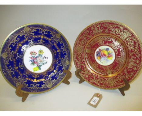 Royal Worcester cabinet plate painted with fruits, signed P. Stanley within a cerise and gilt border together with a similar 