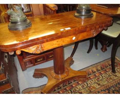 Early Victorian mahogany rectangular fold-over card table on turned centre column and platform base