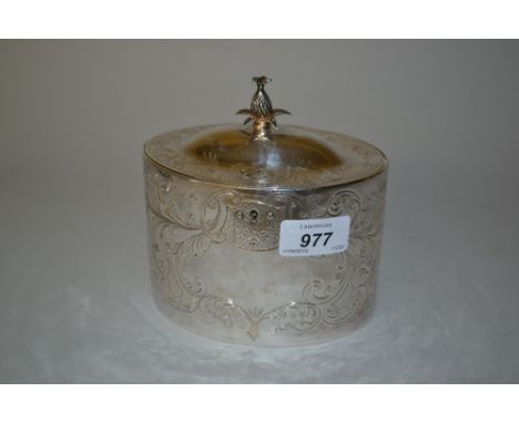 George III oval silver tea caddy, the hinged cover with pineapple finial, London, 1803, with later presentation inscription