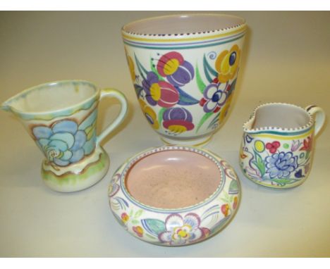 Poole pottery floral decorated jardiniere, similar jug and bowl and a Carltonware jug